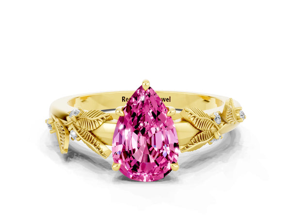 Yellow gold Pear Cut Pink Sapphire Solitaire Ring with Leaf Motif Band and Four-Prong Setting