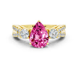 Yellow gold Pear Cut Pink Sapphire Three-Stone Ring with Pavé Split Shank and Four-Prong Setting_36