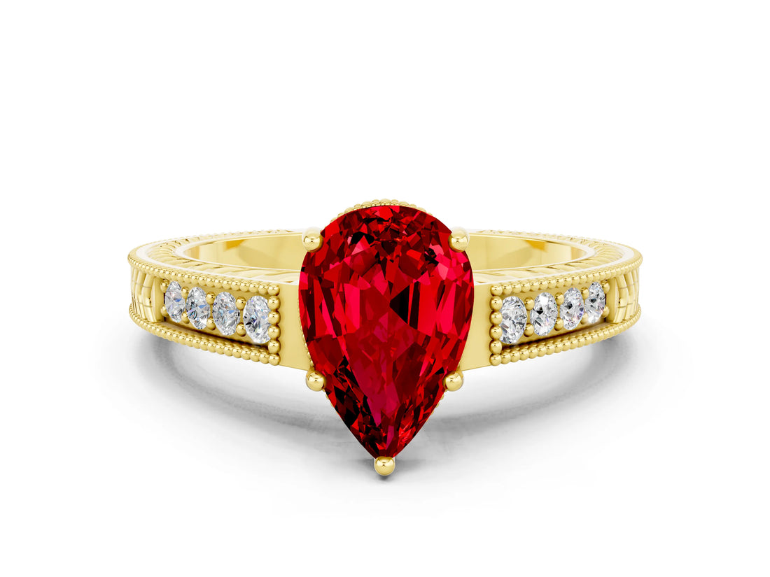 Yellow gold Pear Cut Ruby Engagement Ring with Milgrain Channel Set Band and Prong Setting