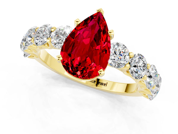 Yellow gold Pear Cut Ruby Prong Setting with Side Stones on a Pave Band