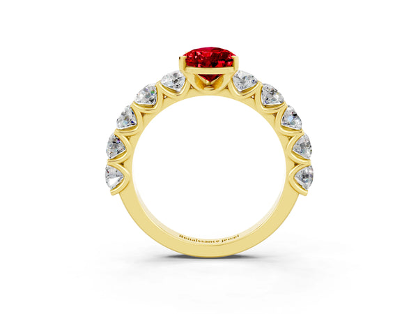 Yellow gold Pear Cut Ruby Prong Setting with Side Stones on a Pave Band