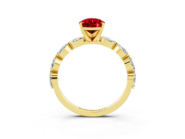 Yellow gold Pear Cut Ruby Ring with Marquise Side Stones and Prong Setting