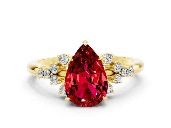 Yellow gold Pear Cut Ruby Ring with Side Stones and Four-Prong Setting
