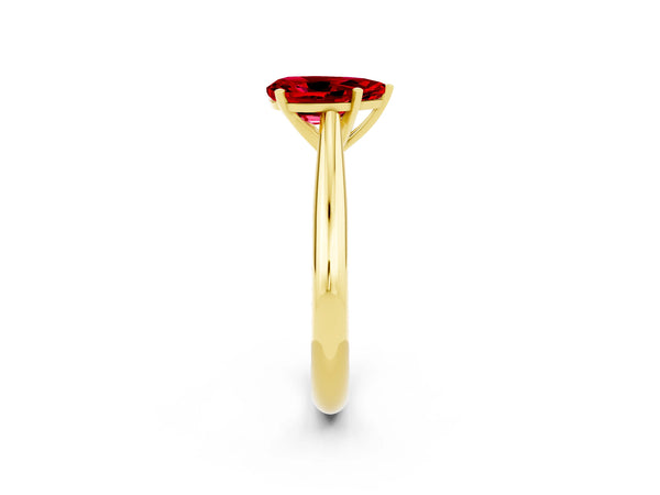 Yellow gold Pear Cut Ruby Solitaire Engagement Ring with Cathedral Setting and Four-Prong Mount