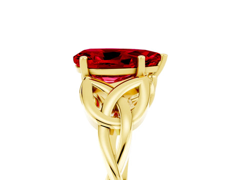 Yellow gold Pear Cut Ruby Solitaire Engagement Ring with Celtic Knot Band and Four-Prong Setting_5
