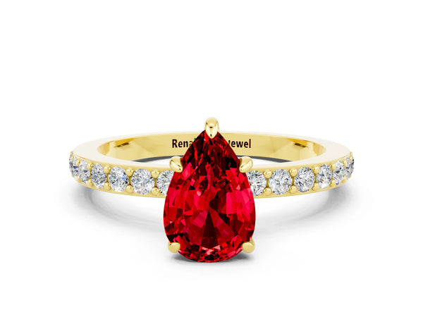 Yellow gold Pear Cut Ruby Solitaire Engagement Ring with Pavé Band and Four-Prong Setting