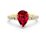 Yellow gold Pear Cut Ruby Solitaire Pavé Band with Four-Prong Setting
