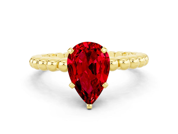 Yellow gold Pear Cut Ruby Solitaire Ring with Beaded Band and Prong Setting