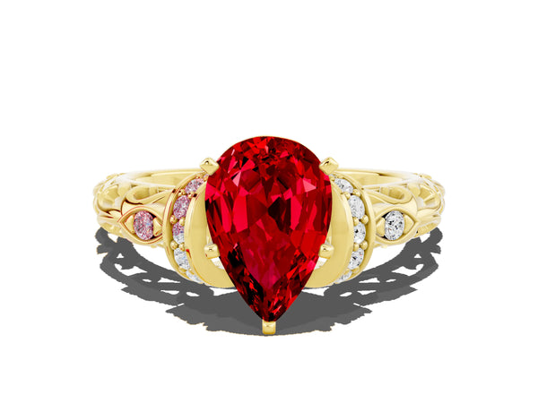 Yellow gold Pear Cut Ruby Solitaire Ring with Filigree Band and Four-Prong Setting