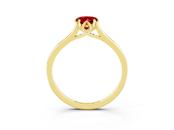 Yellow gold Pear Cut Ruby Solitaire Ring with Flower Prong Setting and Classic Band
