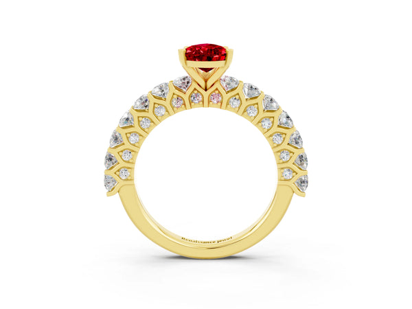 Yellow gold Pear Cut Ruby Solitaire Ring with Shared Prong Pavé Band and Four-Prong Setting