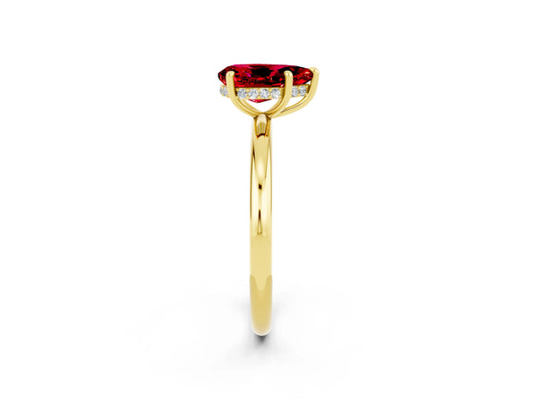Yellow gold Pear Cut Ruby Solitaire Ring with Thin Band and Four-Prong Setting