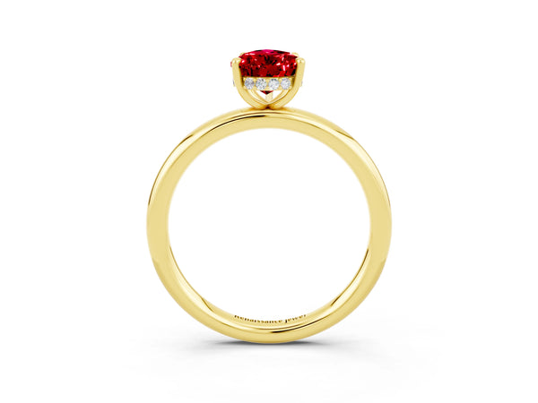 Yellow gold Pear Cut Ruby Solitaire Ring with Thin Band and Four-Prong Setting
