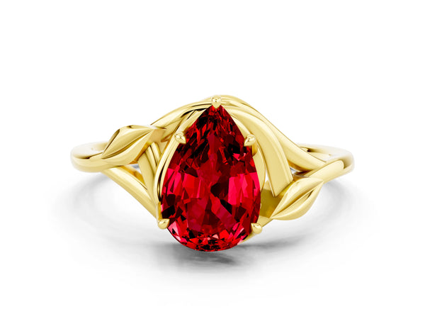 Yellow gold Pear Cut Ruby Solitaire Ring with Twist Band and Four-Prong Setting