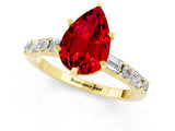 Yellow gold Pear Cut Ruby Solitaire with Side Baguettes and Channel Set Band_1