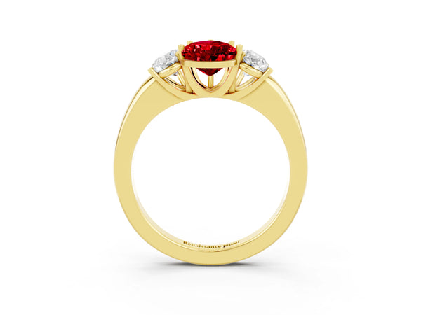 Yellow gold Pear Cut Ruby Three-Stone Ring with Four-Prong Setting and Classic Band