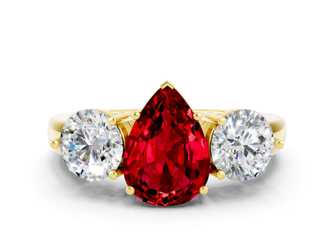 Yellow gold Pear Cut Ruby Three-Stone Ring with Prong Setting and Classic Band