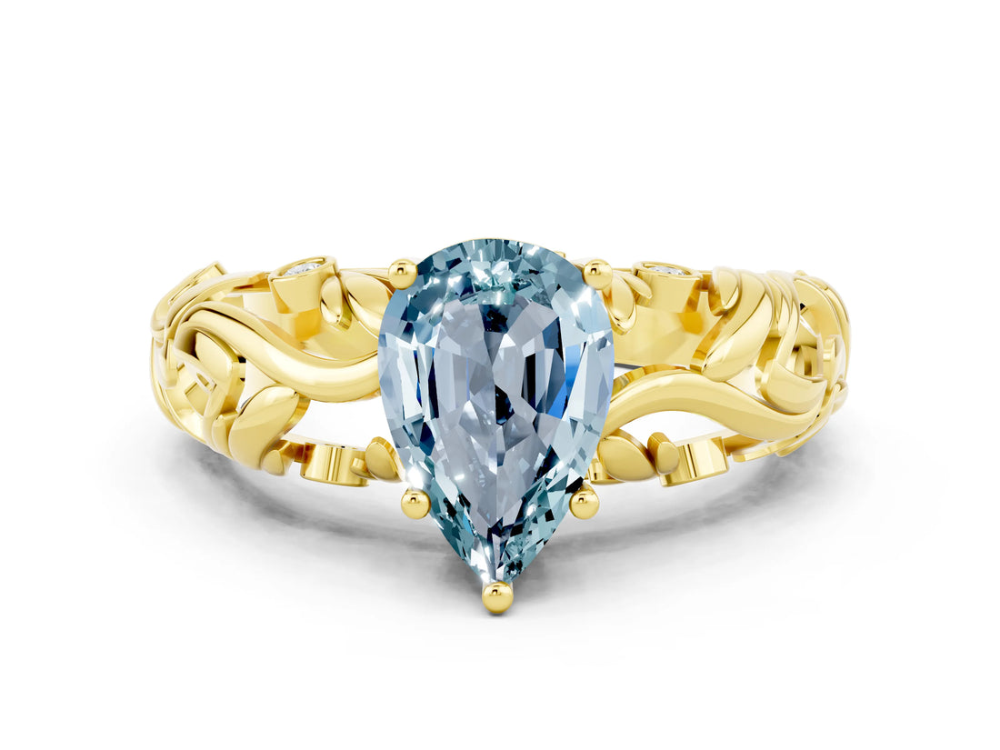 Yellow gold Pear Cut Solitaire Aquamarine Leaf-Inspired Vine Band Ring with Prong Setting