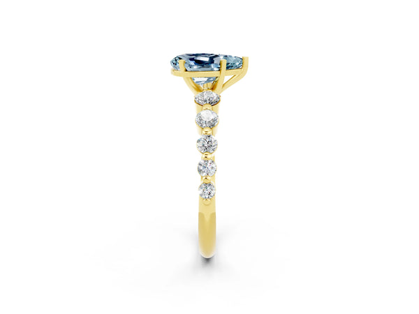 Yellow gold Pear Cut Solitaire Aquamarine Ring with Pave Band and Four-Prong Setting