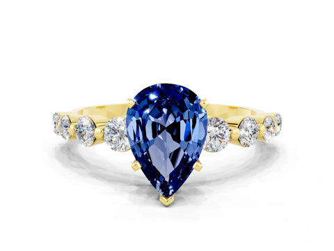 Yellow gold Pear Cut Solitaire Blue Sapphire Ring with Pave Band and Four-Prong Setting