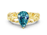 Yellow gold Pear Cut Solitaire Blue Topaz Leaf-Inspired Vine Band Ring with Prong Setting