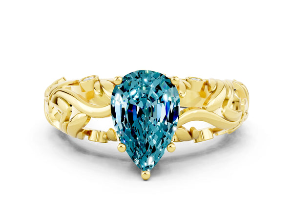 Yellow gold Pear Cut Solitaire Blue Topaz Leaf-Inspired Vine Band Ring with Prong Setting