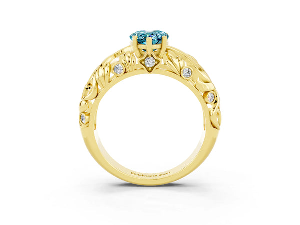 Yellow gold Pear Cut Solitaire Blue Topaz Leaf-Inspired Vine Band Ring with Prong Setting