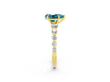 Yellow gold Pear Cut Solitaire Blue Topaz Ring with Pave Band and Four-Prong Setting_2