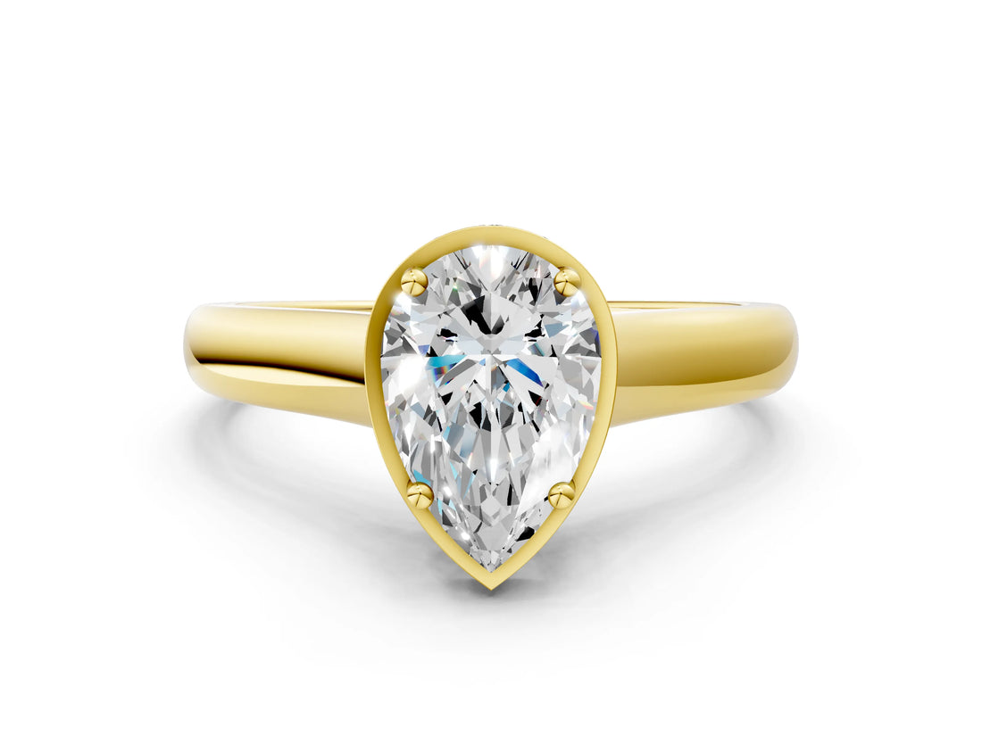 Yellow gold Pear Cut Solitaire Diamond Engagement Ring with Four-Prong Setting and Tapered Band_7