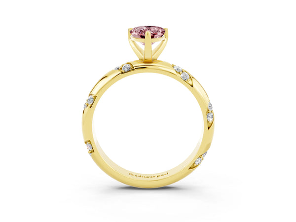 Yellow gold Pear Cut Solitaire Diamond Engagement Ring with Twisted Pave Band and Four-Prong Setting
