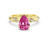 Yellow gold Pear Cut Solitaire Diamond Engagement Ring with Twisted Pave Band and Four-Prong Setting