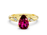 Yellow gold Pear Cut Solitaire Diamond Engagement Ring with Twisted Pave Band and Four-Prong Setting