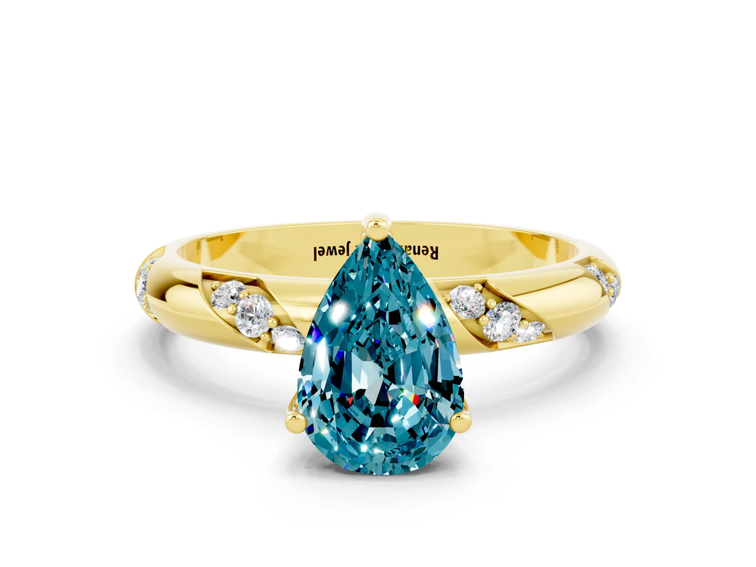Yellow gold Pear Cut Solitaire Diamond Engagement Ring with Twisted Pave Band and Four-Prong Setting