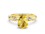 Yellow gold Pear Cut Solitaire Diamond Engagement Ring with Twisted Pave Band and Four-Prong Setting