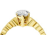 Yellow gold Pear Cut Solitaire Diamond Ring with Infinity Twist Band and Four-Prong Setting_13