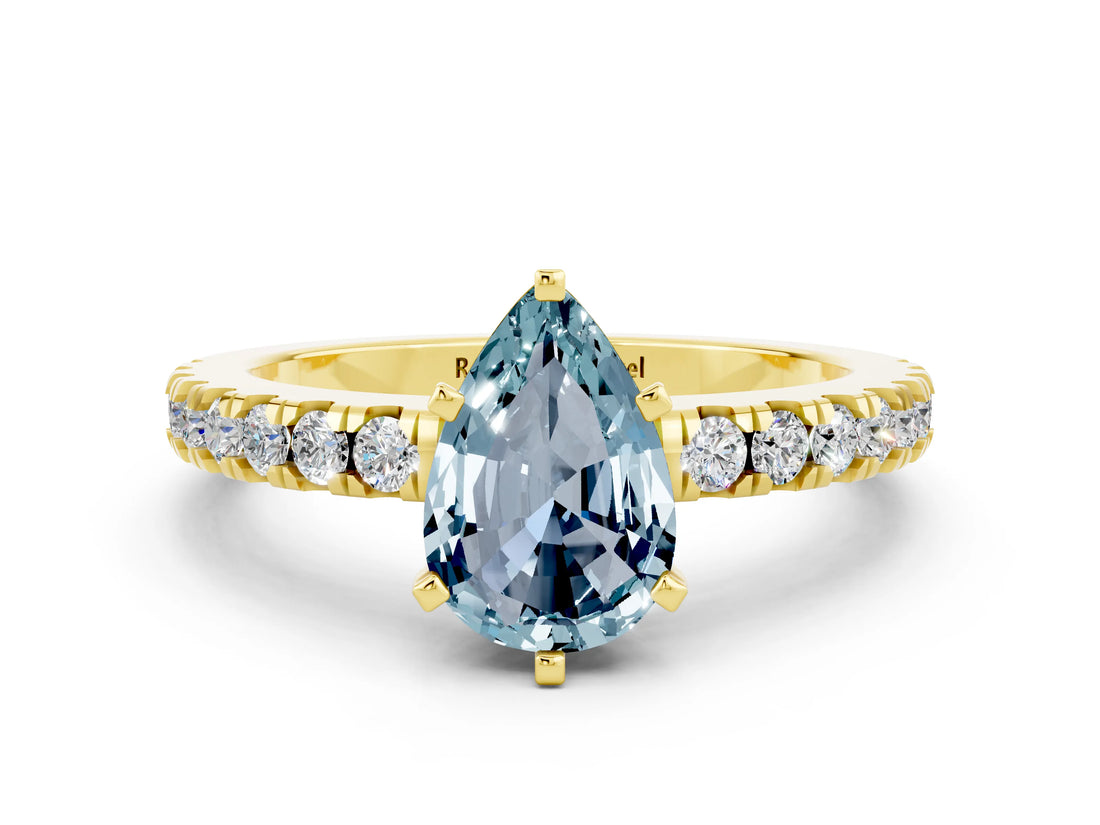 Yellow gold Pear Cut Solitaire Diamond with Pavé Band and Four-Prong Setting