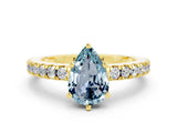 Yellow gold Pear Cut Solitaire Diamond with Pavé Band and Four-Prong Setting
