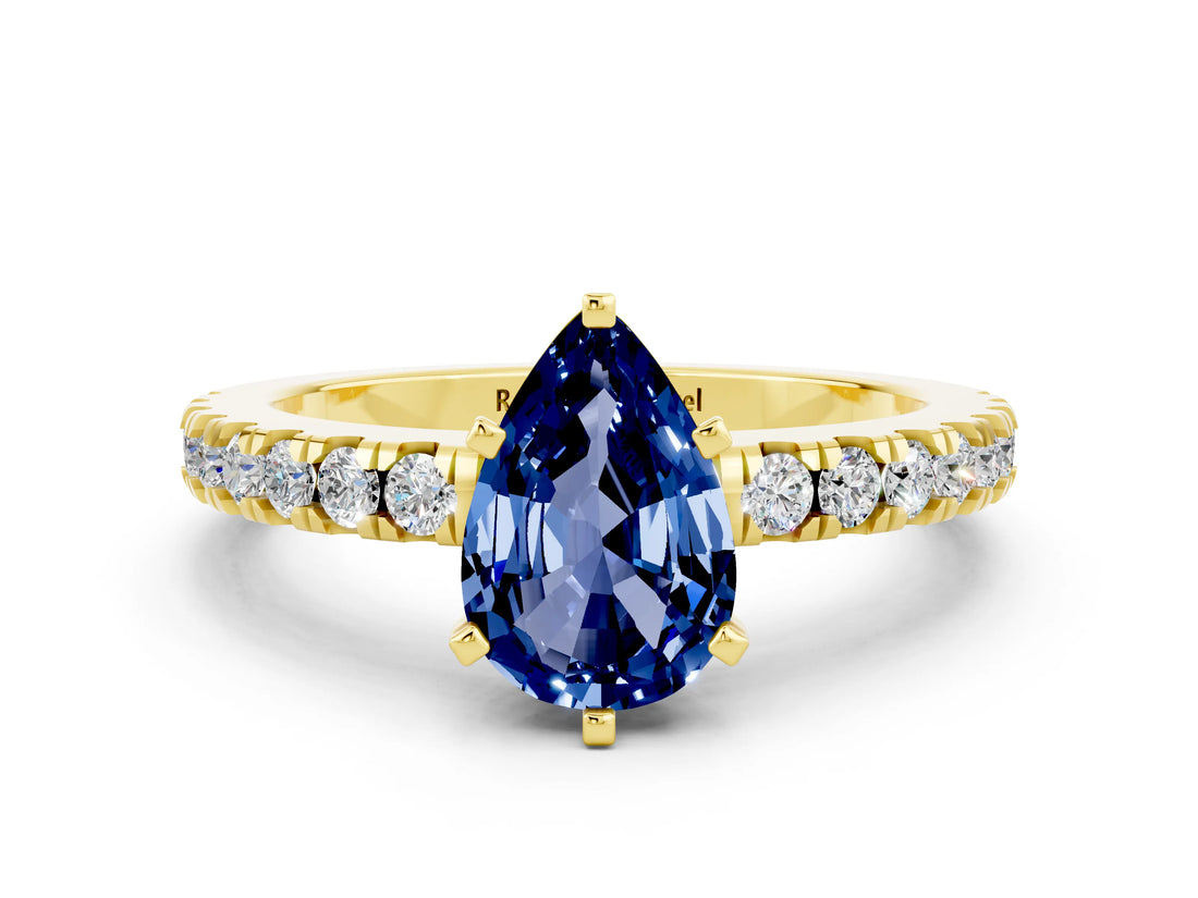 Yellow gold Pear Cut Solitaire Diamond with Pavé Band and Four-Prong Setting