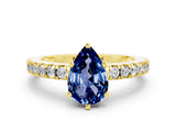 Yellow gold Pear Cut Solitaire Diamond with Pavé Band and Four-Prong Setting