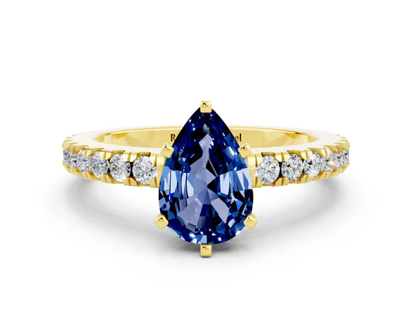 Yellow gold Pear Cut Solitaire Blue Sapphire with Pavé Band and Four-Prong Setting
