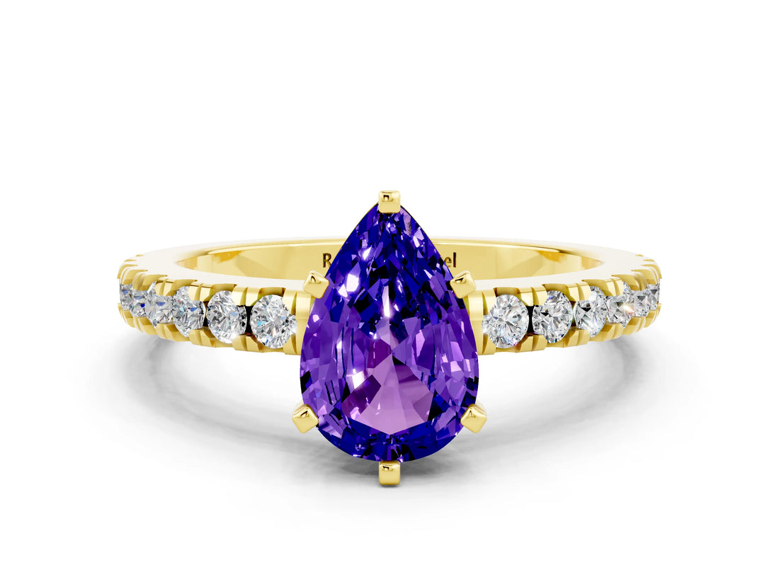 Yellow gold Pear Cut Solitaire Diamond with Pavé Band and Four-Prong Setting