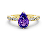Yellow gold Pear Cut Solitaire Diamond with Pavé Band and Four-Prong Setting