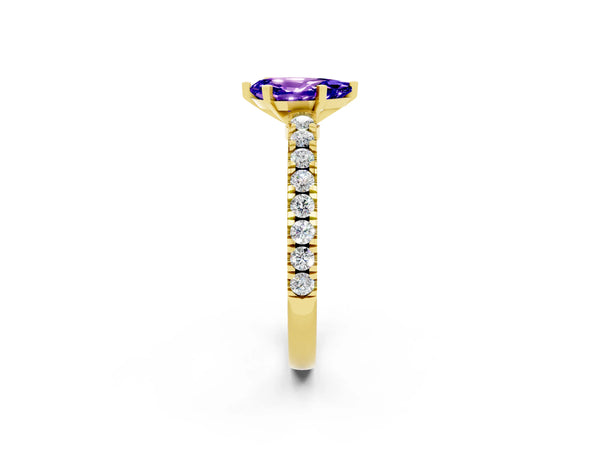 Yellow gold Pear Cut Solitaire Tanzanite with Pavé Band and Four-Prong Setting
