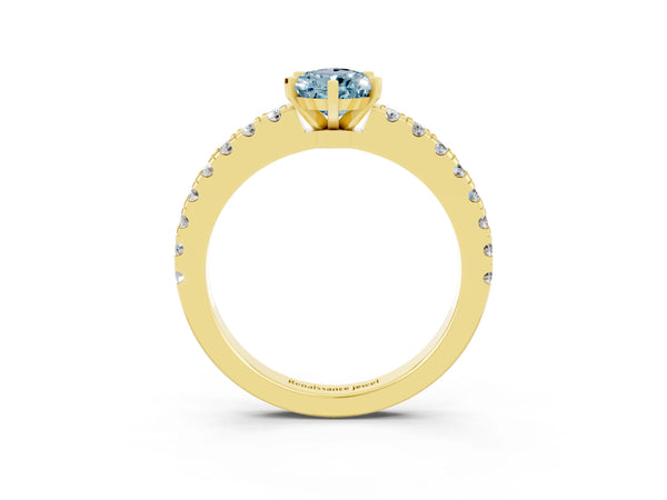 Yellow gold Pear Cut Solitaire Aquamarine with Pavé Band and Four-Prong Setting