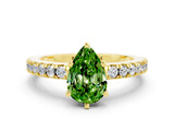 Yellow gold Pear Cut Solitaire Diamond with Pavé Band and Four-Prong Setting