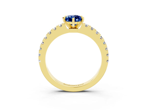 Yellow gold Pear Cut Solitaire Blue Sapphire with Pavé Band and Four-Prong Setting