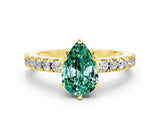 Yellow gold Pear Cut Solitaire Diamond with Pavé Band and Four-Prong Setting