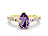 Yellow gold Pear Cut Solitaire Diamond with Pavé Band and Four-Prong Setting