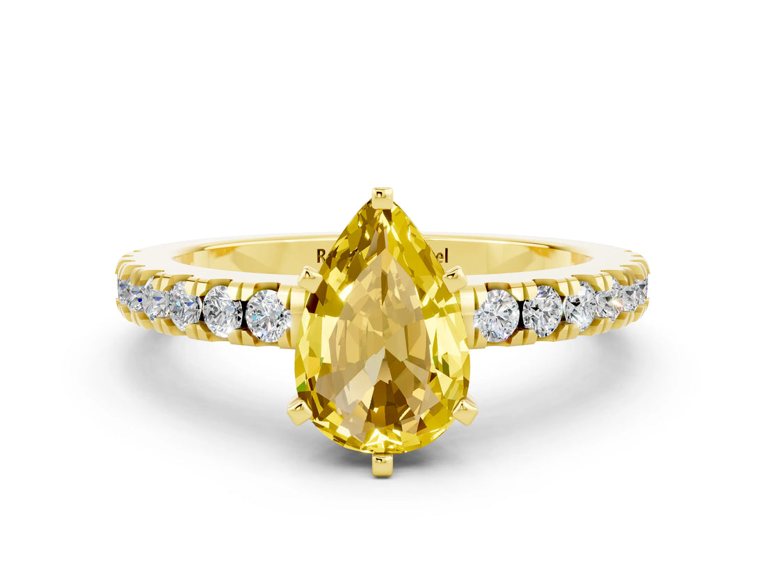 Yellow gold Pear Cut Solitaire Diamond with Pavé Band and Four-Prong Setting
