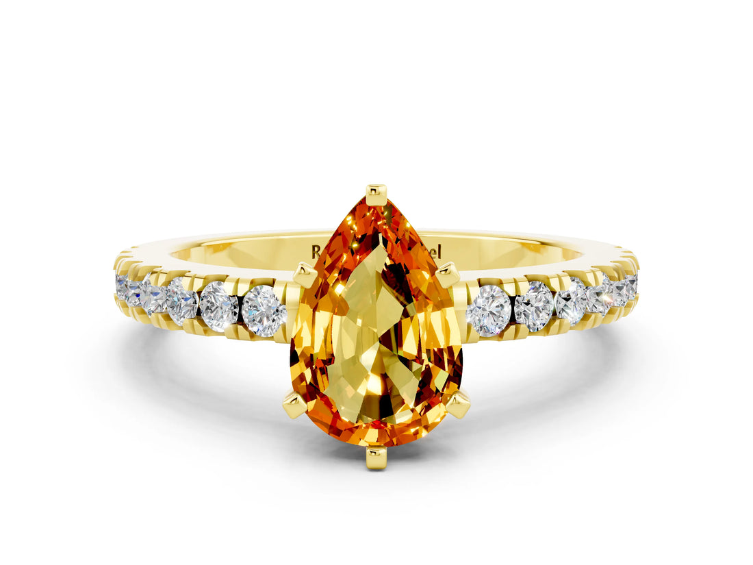 Yellow gold Pear Cut Solitaire Diamond with Pavé Band and Four-Prong Setting